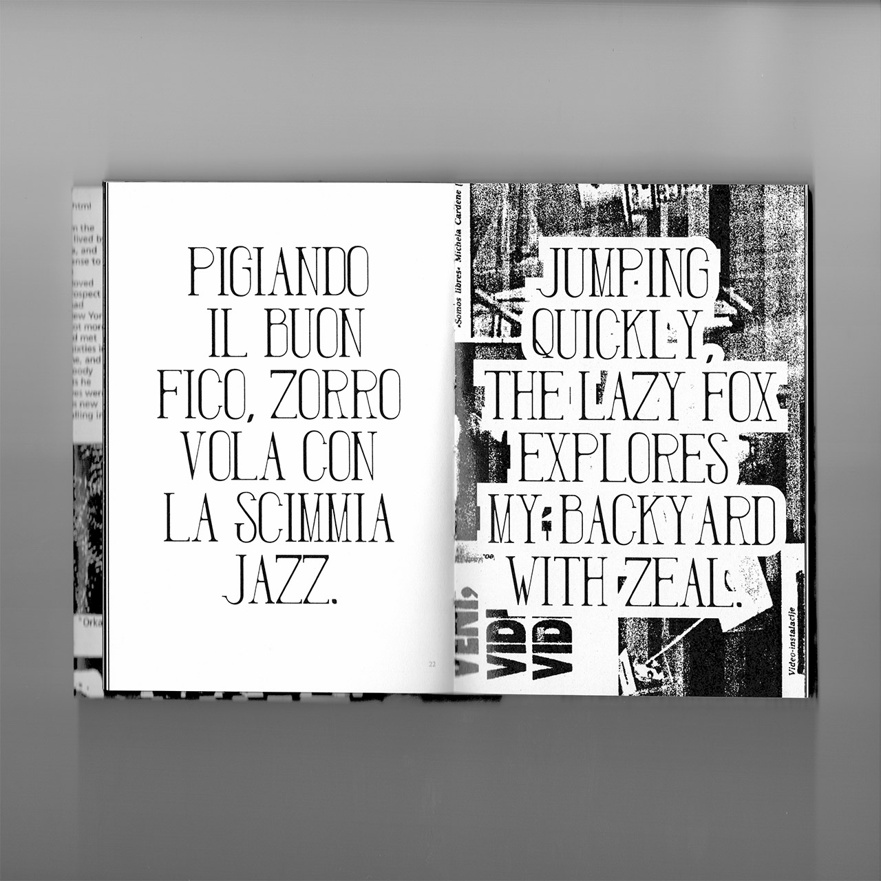 Volume di grafica aperto su doppia pagina con composizioni tipografiche in bianco e nero
