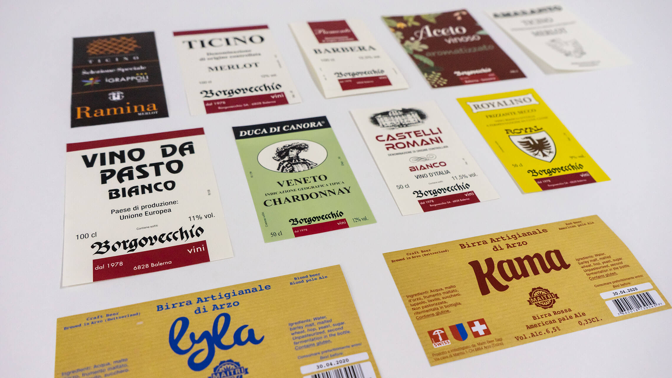 Etichette per vino Merlot del Ticino e per birra artigianale di Arzo, stampate su carta adesiva